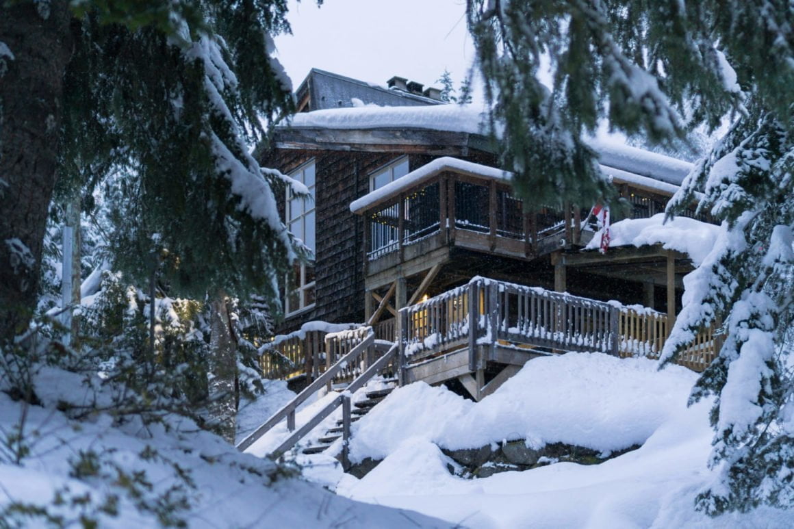 whistler lodge hostel exterior in winter