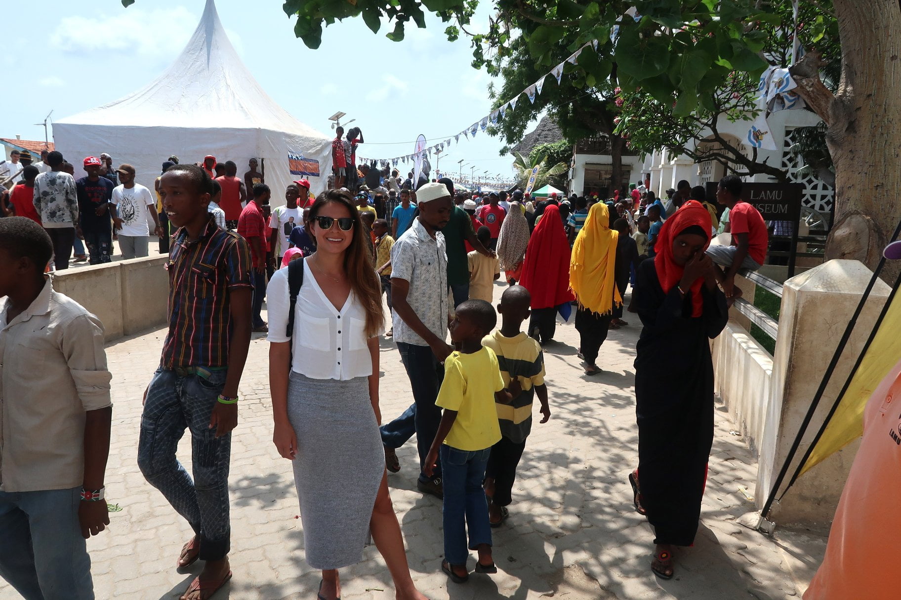 Kim blending in with the locals in Lamu Town, while backpacking in Kenya