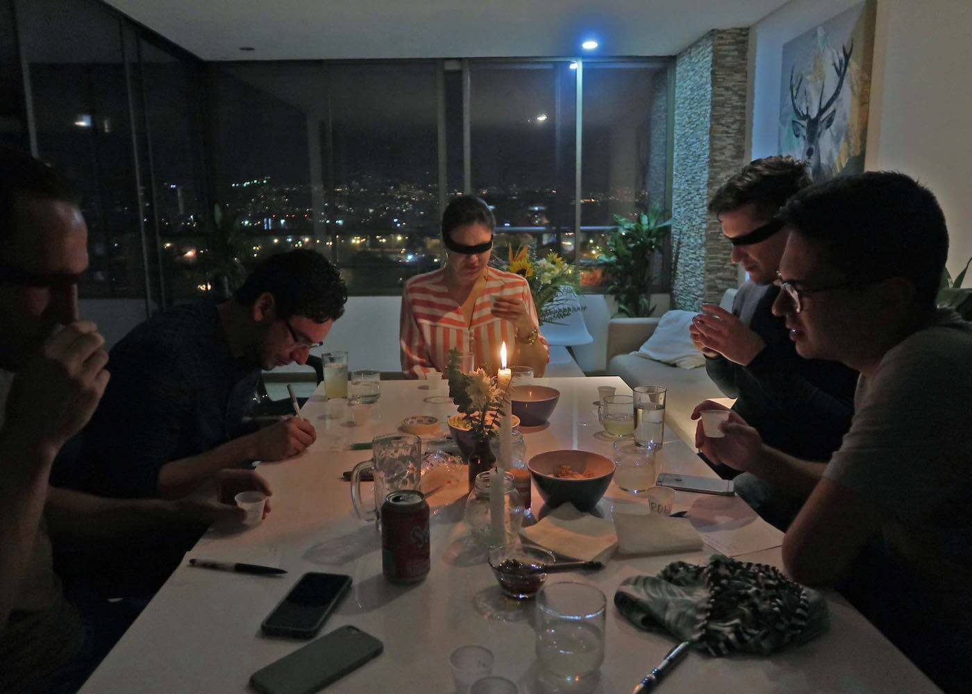 Table of people tasting Colombian aguardientes