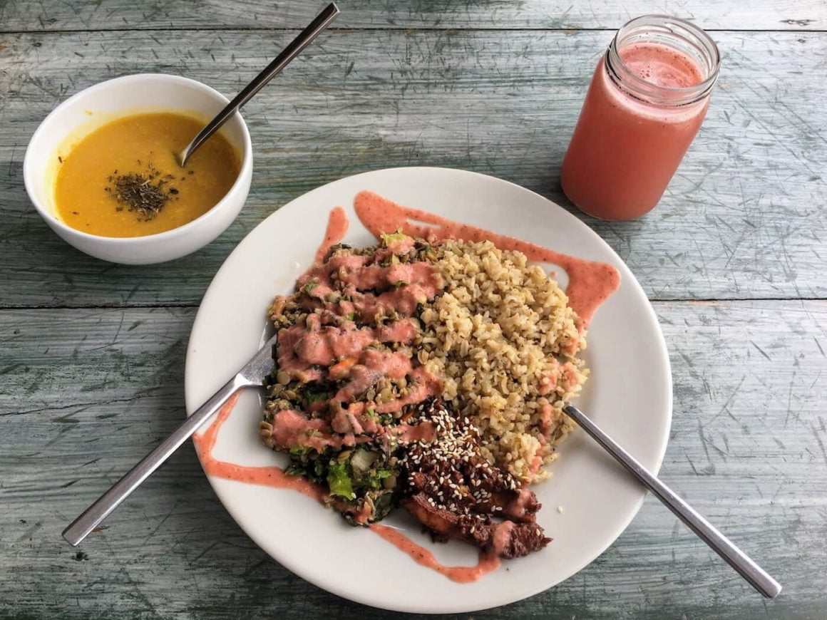 Dharma Vegan Restaurant's soup, menu del dia, and juice pictured from above