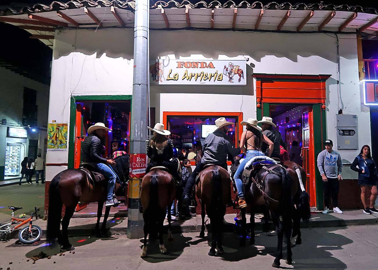Horses in front of a bar in Urrao