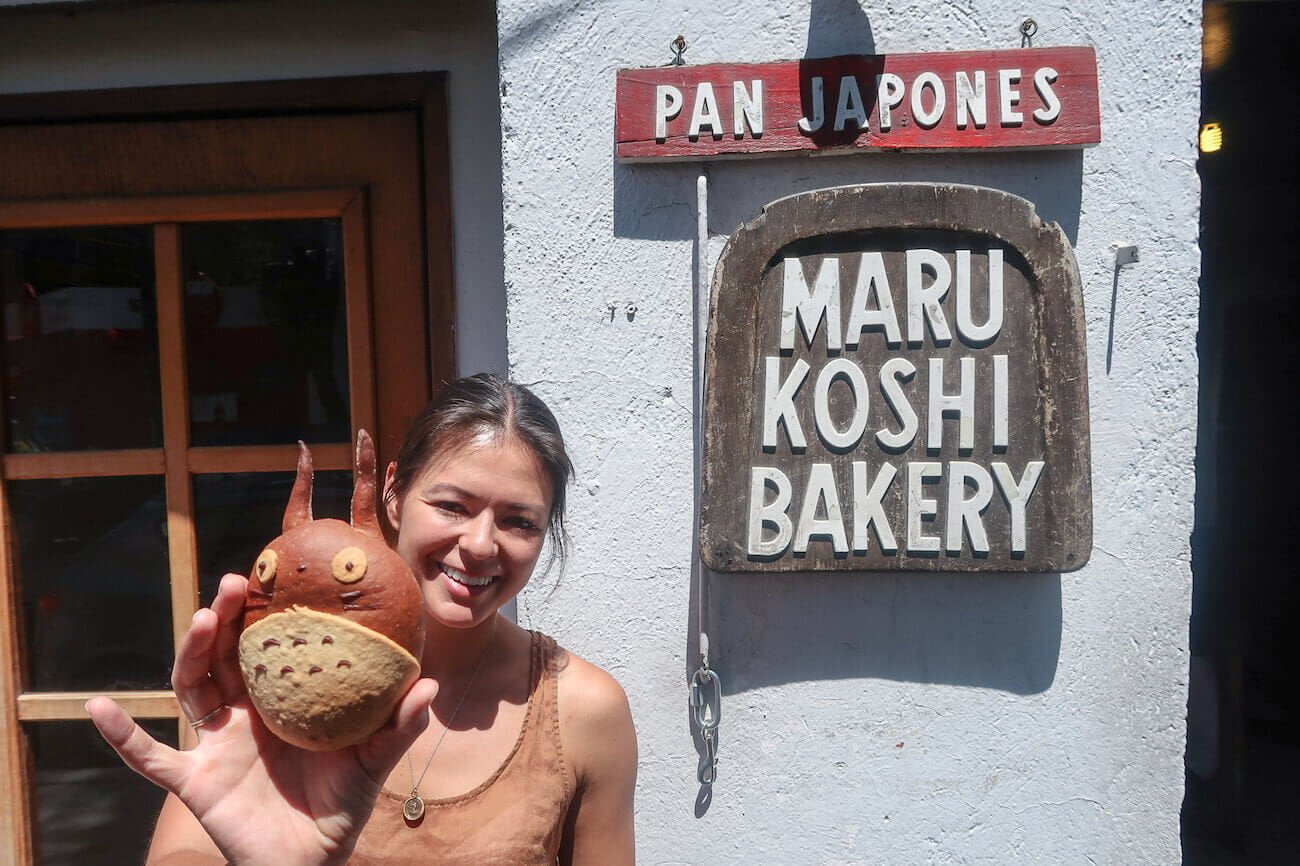 Kim showing off a pastry at Marukoshi bakery by Coyoacan