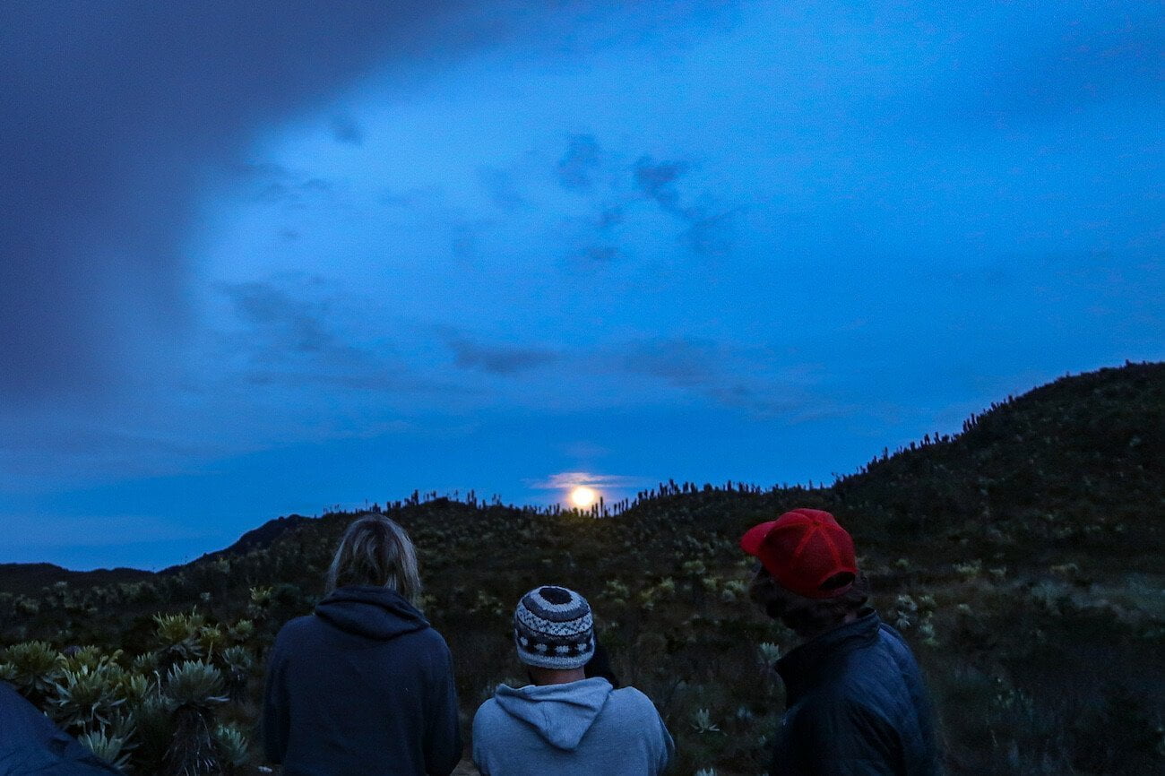 Chris, Jess, and Jorge looking at moonrise