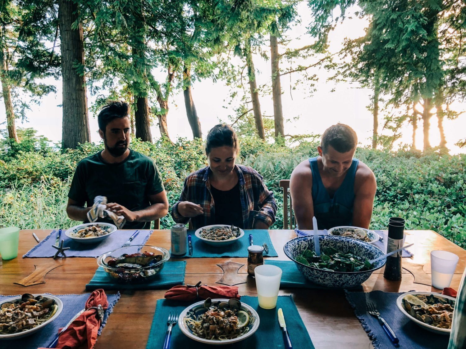 group eating meals together on savary island