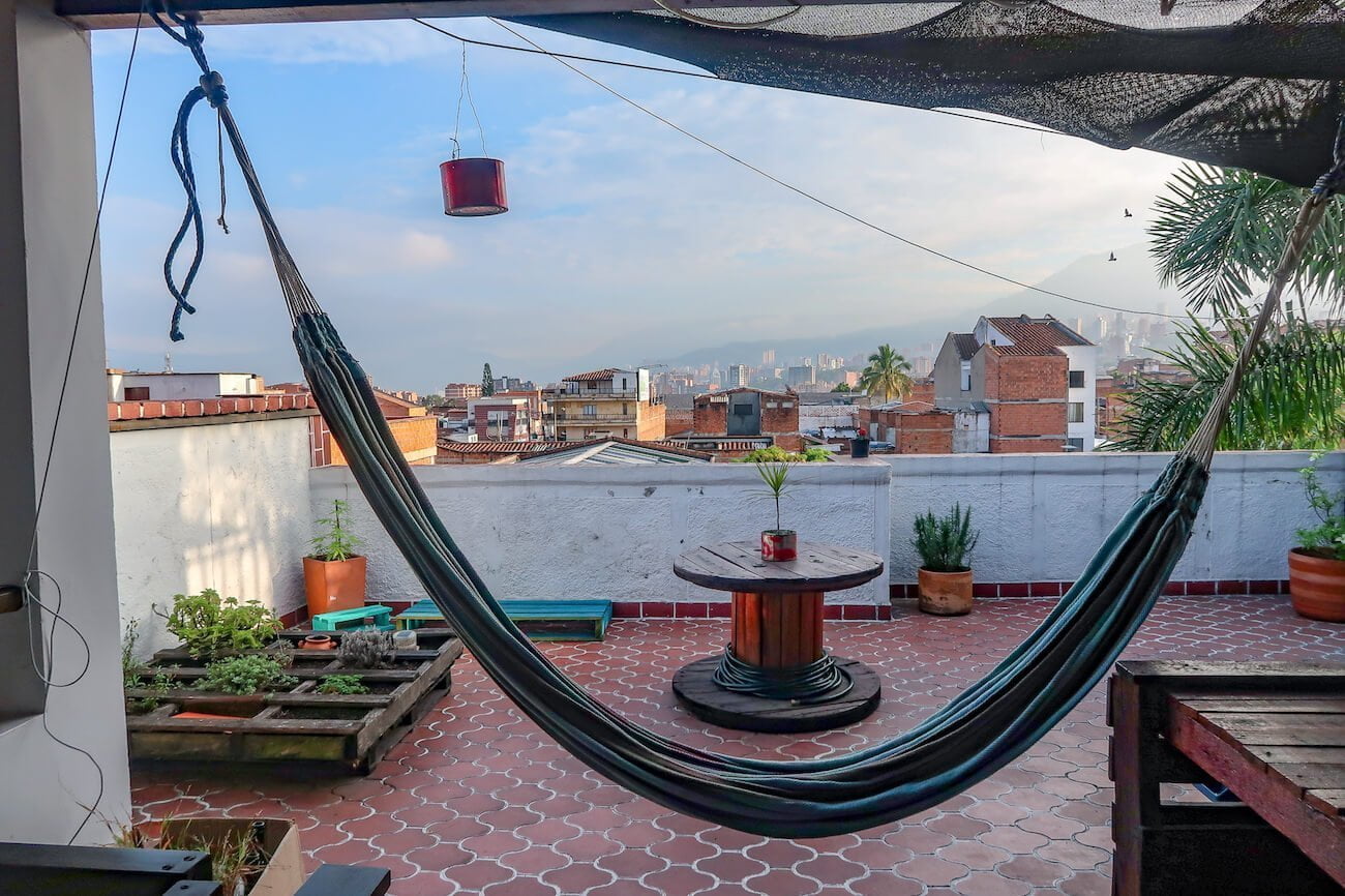 Hammock, patio, and view from our Envigado Airbnb