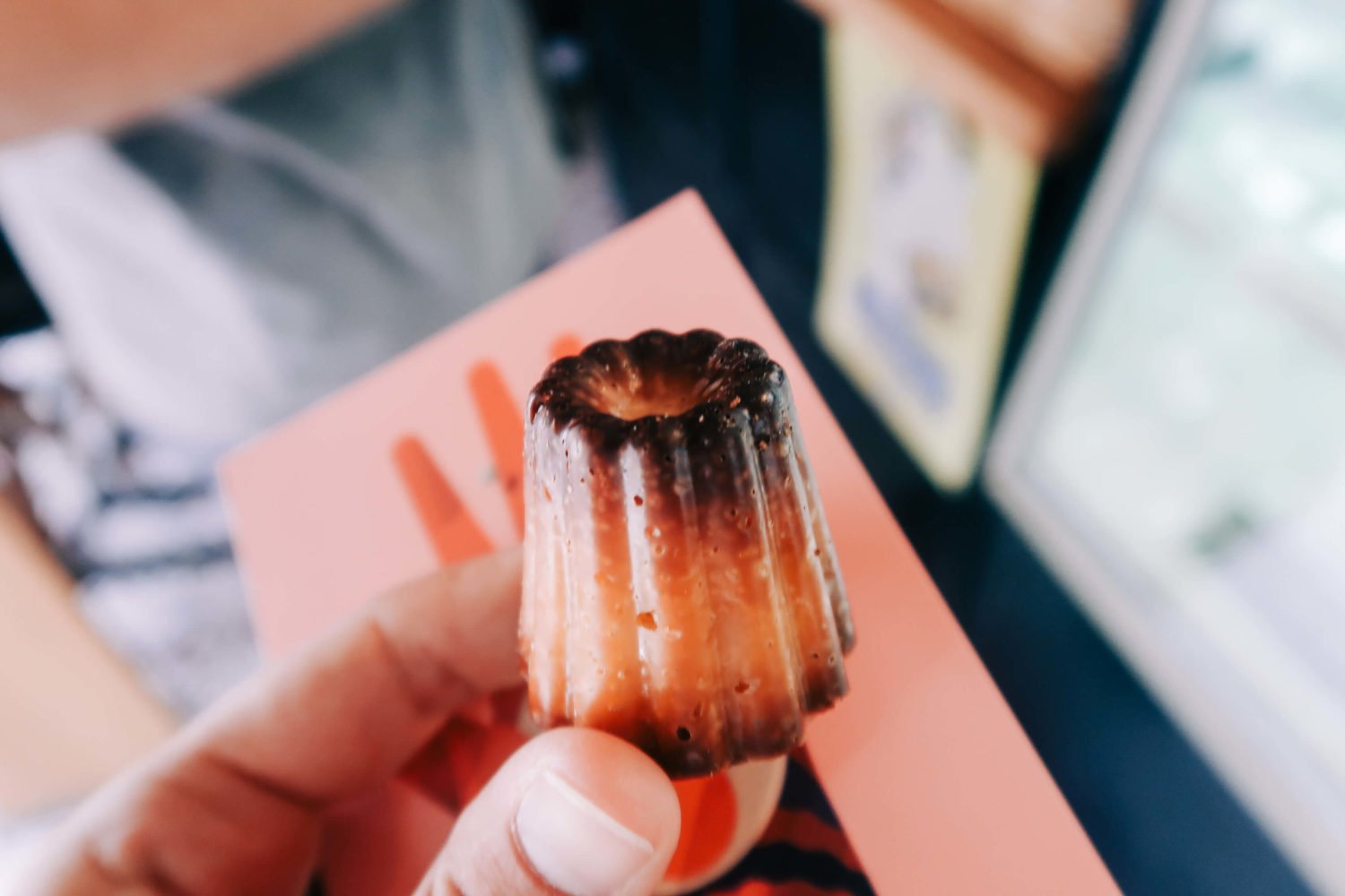 a close up of a canele from la boheme in mexico city