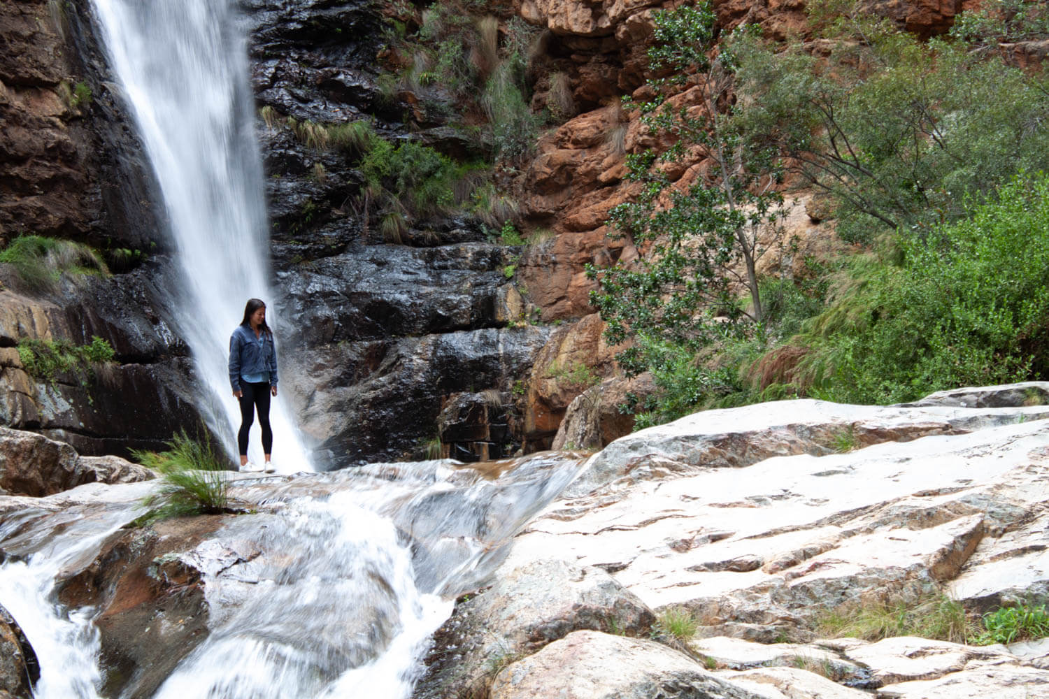 Close up of Kim in front of Meiringspoort Waterfall