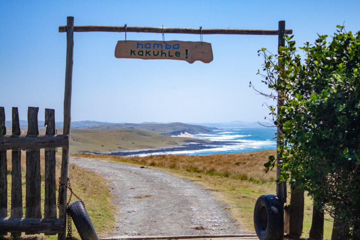 South Africa Road Trip Planning tips cover image of a sign saying bon voyage in xhosa
