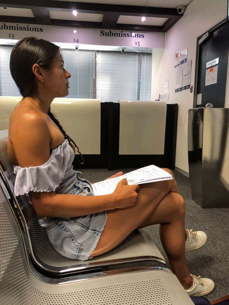 Kim waiting to submit her application to extend her South African travel visa