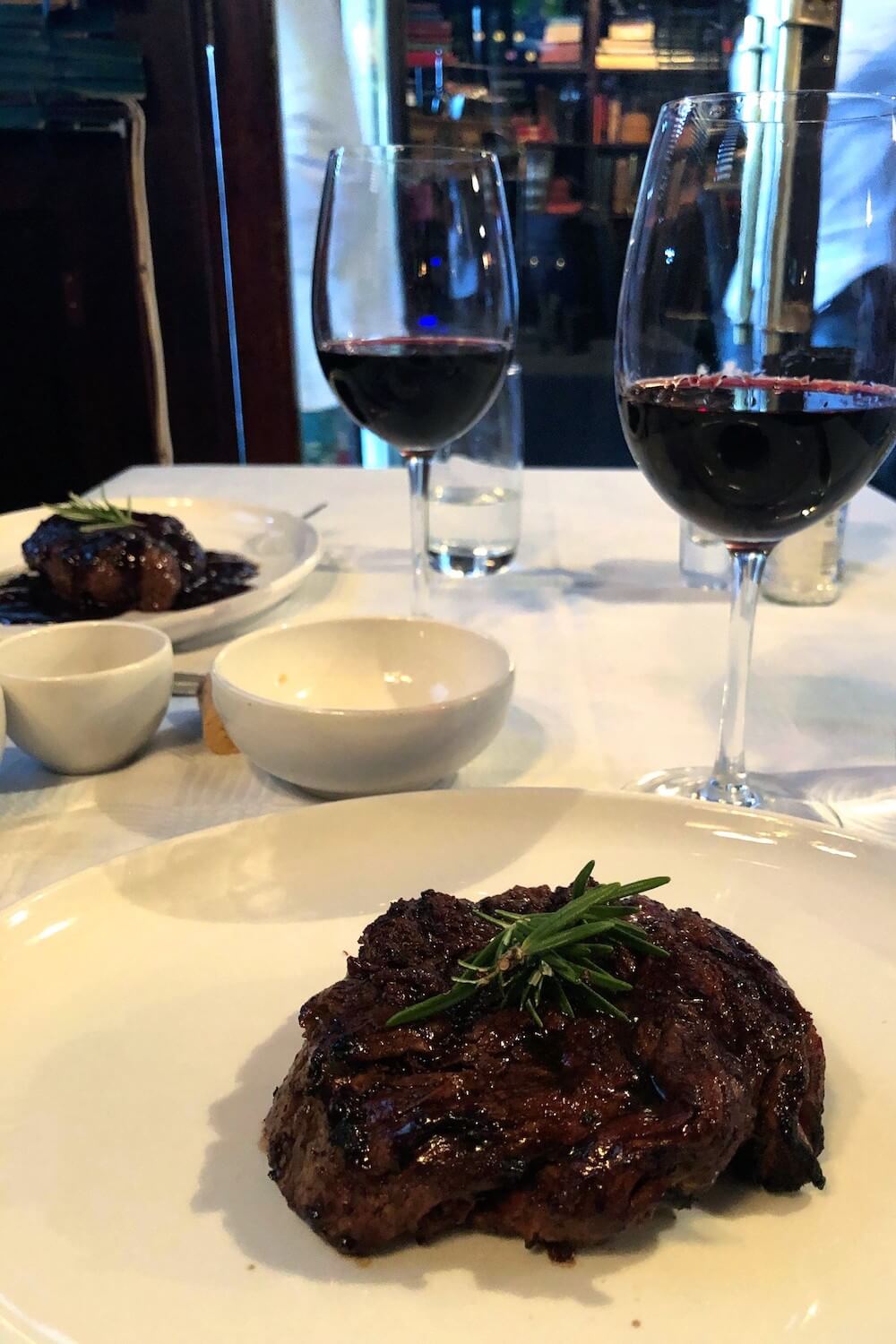 Steak and wine at Hussar Grill, a classic Cape Town restaurant known for great steaks. 