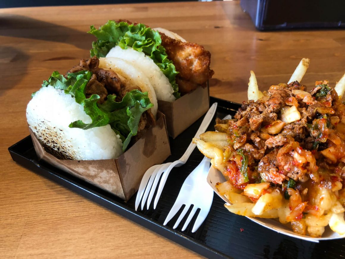 Close up of rice burgers and kimchi poutine from Rice Burger.
