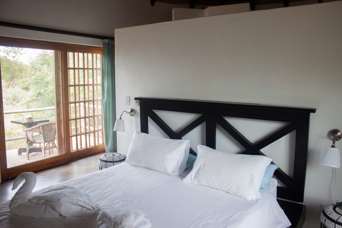 Bed at Mbizi Lodge.