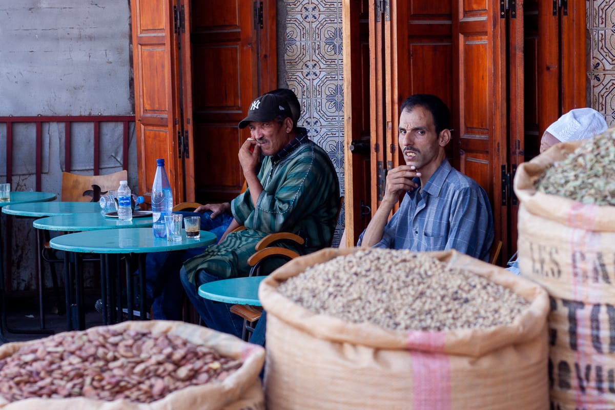 Moroccan men drinking coffee and tea in Marrakech.