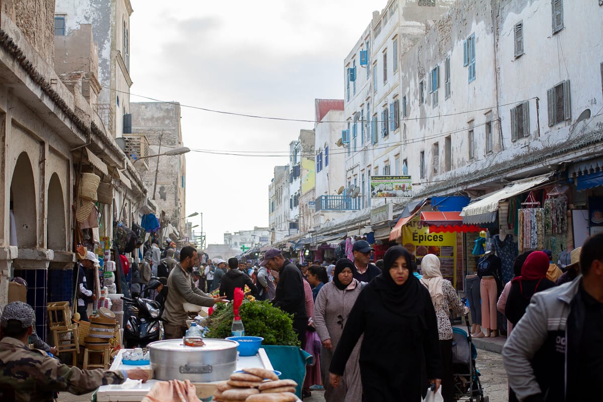 Busy medina streets on a cloudy day in Essaouira