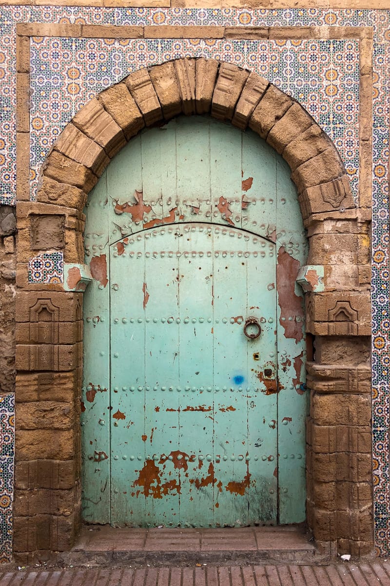 Admiring the intricate doors in Essaouira's medina